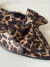 Rasteira Animal Print Laço na internet