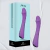 Dildo vibrador morado Infinity Infarta con textura realista y botones de control, junto a su caja de embalaje celeste y negra