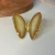 Borboleta de Ágata Bege