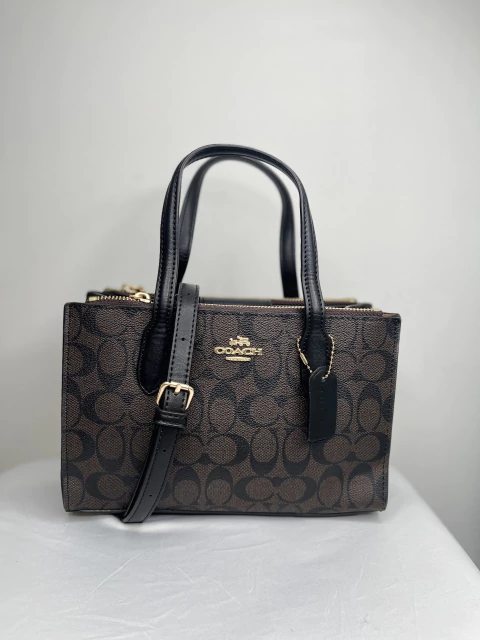 Manos libres Coach negro