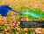 Sopladora eléctrica portátil Gadnic azul soplando hojas secas sobre césped verde