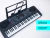Teclado musical órgano de 61 teclas con porta partituras y pantalla LCD incorporada