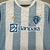 camisa-paysandu-papão-lobo-lobão-2025-2026-25-26-modelo-torcedor-masculino-azul-branco-branca-dourado-lançamento-nova-home-casa-I-titular-banpará-1