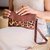 Pochete Envelope Couro Wishin (Leopardo Caramelo/Moka) - comprar online