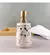 DISPENSER CERAMICA MARMOL DORADO 400 CC PORTA JABON LIQUIDO en internet