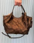 Bolsa Pirarucu Floater Ouro Latão - comprar online