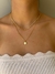 Colar duplo dourado com pingente de trevo