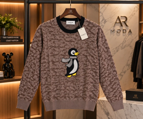 Suéter Coach pinguino