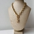 Colar Folheado a Ouro 18k correntaria fecho gravata com pingente de cadeado