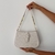 Bolsa com correntes e fivela - comprar online
