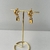 Brinco Folheado a Ouro 18k argola com pingente e ponto de luz na internet