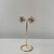 Brinco Folheado a Ouro 18k flor com pontos de luz - comprar online