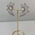 Brinco Folheado a Ouro 18k leque cravejado na internet