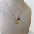 Colar Semi Joia banhado a Ouro 18k com coração e ponto de luz azul - comprar online