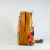 Mochila Isa Flores mostaza - Quidel Mayorista