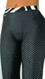 Pantalones oxford con estampado de pintitas blancas sobre fondo negro.