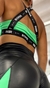 Detalle de la ropa deportiva BIKER VIKINGA LIMA con diseño en verde y negro.