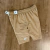 Bermuda Nike Basic Bege na internet