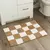 Alfombra de baño color marrón y blanco con diseño de cuadros suaves, tamaño 40x60 cm.