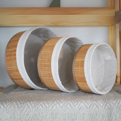 Set de tres cestas circulares de bambú con forro blanco
