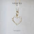 Pingente coração vazado com zircônias - ouro 18k na internet