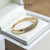 1/2 aliança aparador cravejada - ouro 18k - comprar online