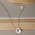 Gargantilha letra madrepérola - ouro 18k - comprar online