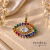 Pingente olho colorido - ouro 18k