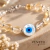Pulseira pedras e olho grego - Prata 925