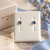 Brinco ponto de luz azul - ouro 18k - comprar online