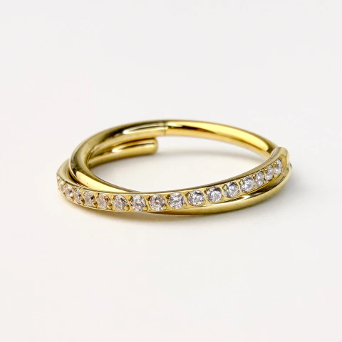 Argola cliker transpassada lisa e cravejada - Titânio PVD Gold