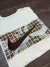 CAMISETA NIKE SPORTSWEAR "DO NOT REMOVE THIS LABEL" - comprar online
