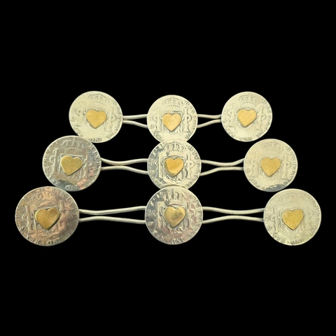 Junta de 9 monedas con oro