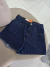Short jeans azul brilho na internet