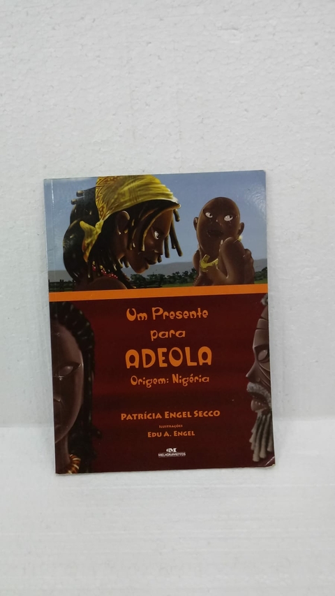 Um Presente para Adeola - Origem: Nigéria - Autor: Patrícia Engel Secco (2013) [usado]