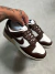 Nike dunk marrom na internet