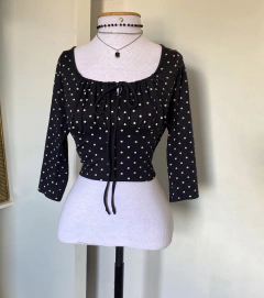 Blusa poá
