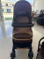 Conjunto Carrinho e Bebê Conforto Infantil Marrom - As vezes tem