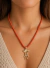COLAR DE HOWLITA CORAL COM PINGENTE MENINA SEMI JOIA - comprar online