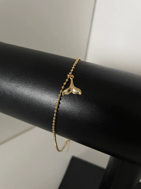 Tornozeleira dourada