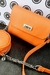 Cartera Cherry Hill Naranja. en internet
