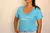 CAMISETA BABY LONG AZUL TURQUESA
