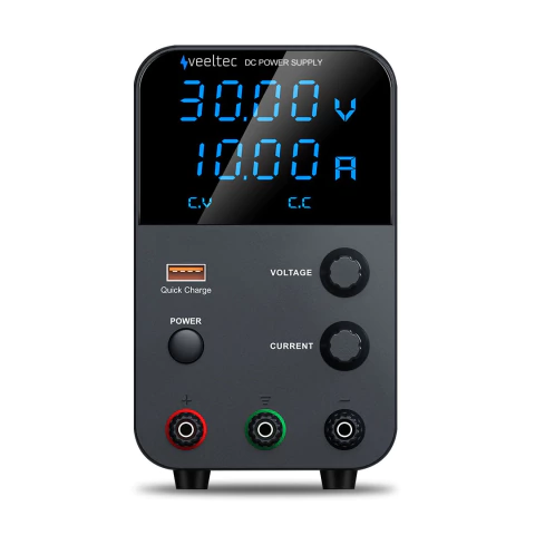 Fuente de alimentación regulable Veeltec con pantalla digital mostrando 30 voltios y 10 amperios, con controles de voltaje y corriente