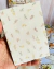 Kit de Papéis, Adesivos e Efêmeras – 100 Peças - Erva Doce Scrap