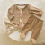 Conjunto plush beige en internet