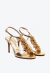 Sandália couro ouro light Cecconello com salto alto, miçangas e tira ajustável. Destaque-se em festas e eventos especiais. Compre e brilhe com elegância!