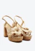 Sandália couro nude Cecconello com salto plataforma 10,5cm, flor artesanal e tiras finas. Conforto, elegância e estilo para seu verão. Garanta a sua!