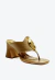 Tamanco em couro verde, salto médio bloco, divisor de dedos e detalhe dourado. Sofisticação e conforto para looks modernos. Garanta o seu!