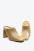 Mule feminino nude em couro, salto bloco alto 9cm, bico quadrado e design minimalista. Sofisticação e conforto para looks urbanos. Garanta já o seu!