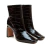Bota feminina couro croco preto, bico quadrado, salto bloco alto e zíper prático. Sofisticação e conforto para looks modernos. Garanta já a sua!